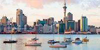 Boats on the water in front of the cityscape of Auckland, New Zealand